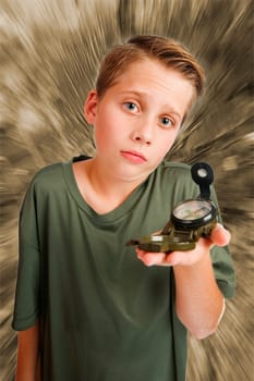 Image of a 12-year-old Caucasian boy in an elevated, wide-angle three-quarter view with a compass on his left hand, looking at the camera helplessly against a monochrome, radially distorted background.