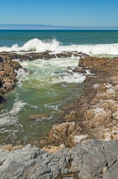 Waves Crashing over the Coastal Rocks at the Strawberry hill Beach in Oregon