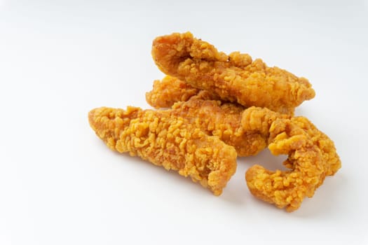 Fried breaded chicken fillet isolated on white background