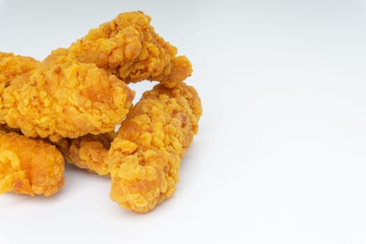 Fried breaded chicken fillet isolated on white background