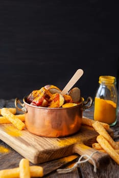 Delicious bratwurst with a spicy tomato curry sauce