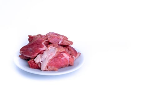 Fresh raw beef steak isolated on white background with selective focus