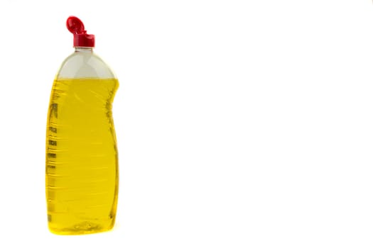 Dishwashing liquid detergent or soap in plastic bottle isolated on white background. Selective focus and copy space concept