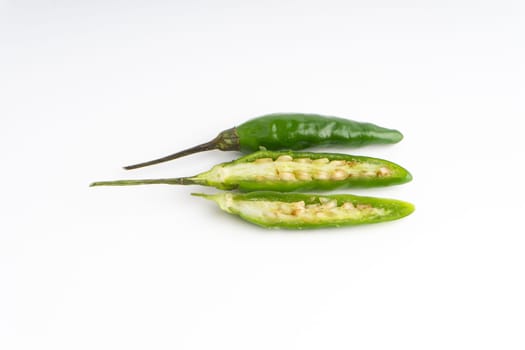 Green Bird’s eye chili,Thai Chili pepper ,bird chili pepper nature isolate on white background. Selective focus and crop fragment
