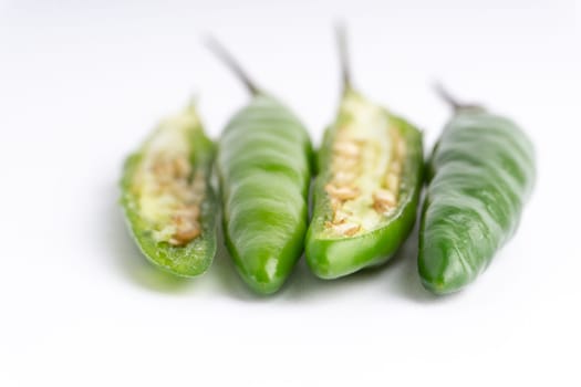 Green Bird’s eye chili,Thai Chili pepper ,bird chili pepper nature isolate on white background. Selective focus and crop fragment