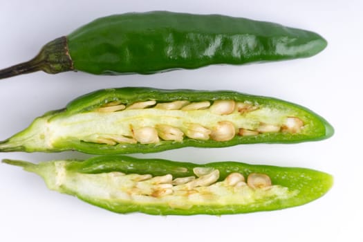 Green Bird’s eye chili,Thai Chili pepper ,bird chili pepper nature isolate on white background. Selective focus and crop fragment