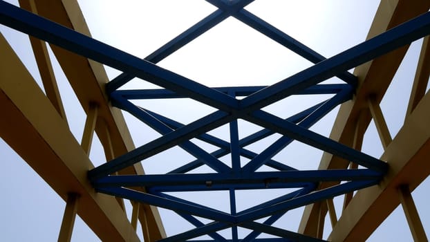 Metal construction against sky