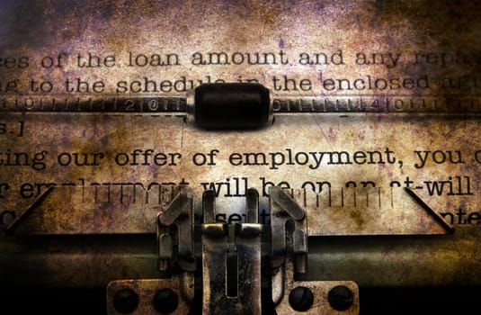 Employment form on vintage typewriter