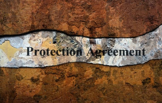 Protection agreement text on wall