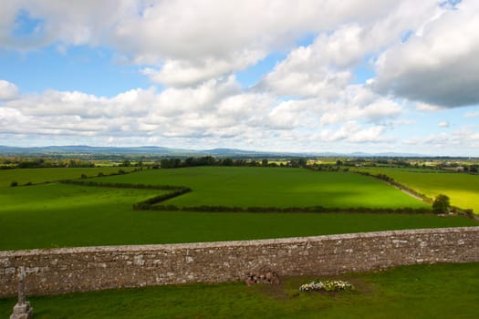 view from the rock of Cashel of the beautiful green fields and countryside