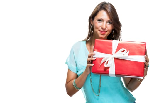 Happy attractive young woman with red gift with white bow Cheerfully isolated against white background with text space