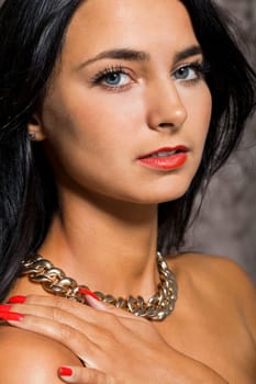 Young pretty girl woman with long black hair in red top as portrait with text space