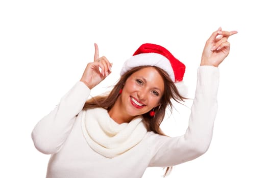 Young woman with Santa hat shows with her hands in the air on text-free presentation of seasonal products isolated on white background free-platers