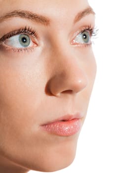 Close-up of a female face with eye lip nose and eyebrows isolated on white background