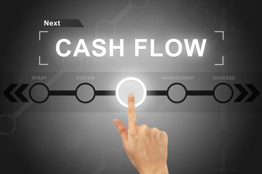 hand clicking cash flow button on a touch screen