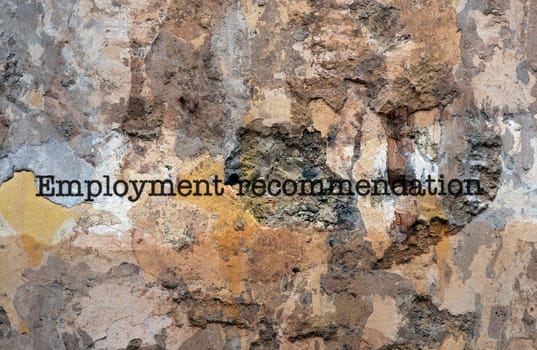 Employment recommendation text on wall