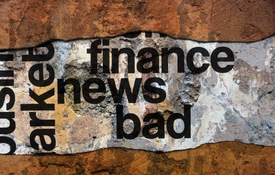 Bad finance news text on wall