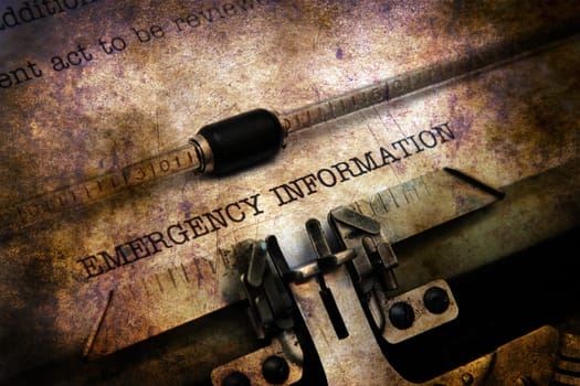 Emergency information text on typewriter