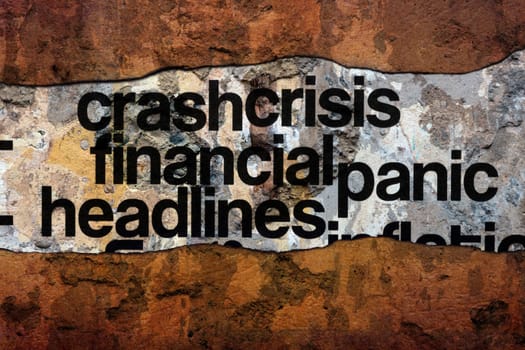 FInancial crisis headlines text on wall