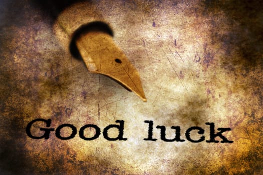 Fountain pen on good luck text