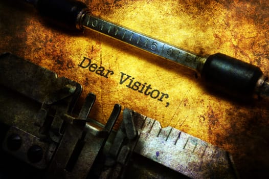 Dear visitor text on typewriter