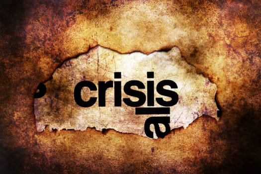 Crisis text on paper hole grunge concept