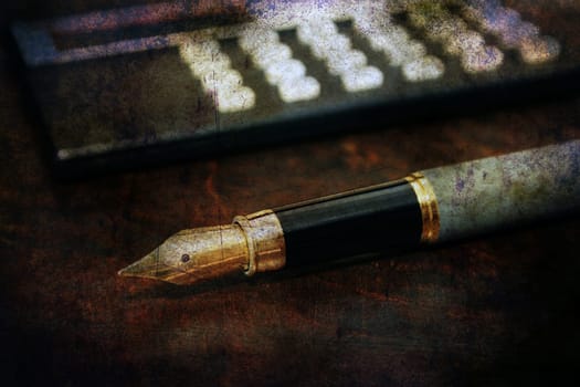 Fountain pen and calculator
