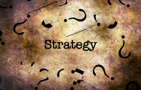 Strategy and question mark grunge concept