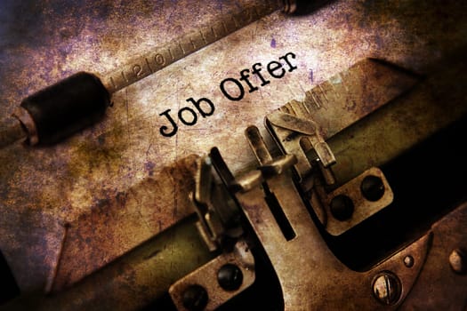 Job offer text on vintage typewriter