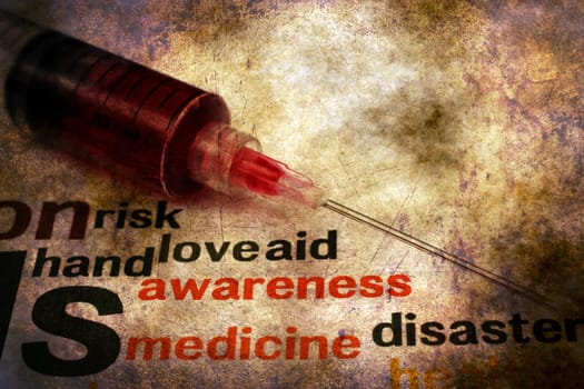 Syringe on health grunge concept