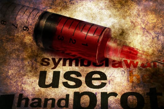 Syringe on health grunge concept