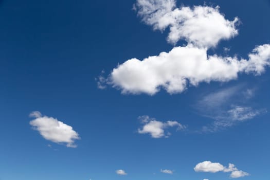 The blue sky with a white cloud