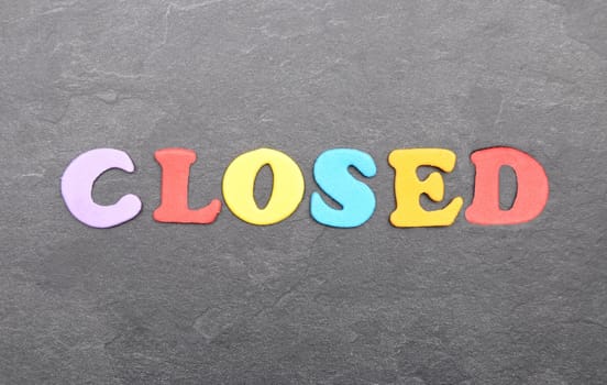 Term from colorful letters on slate board
