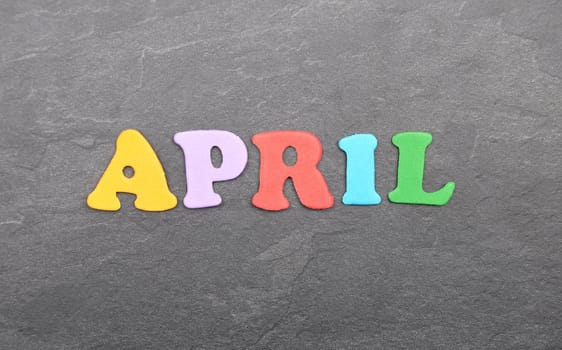 Term from colorful letters on slate board