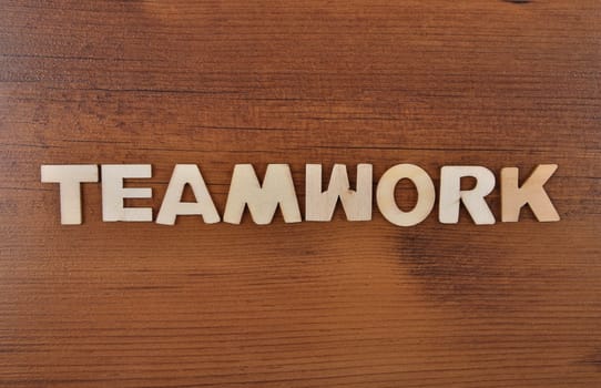 Term from wooden letters on old wooden board