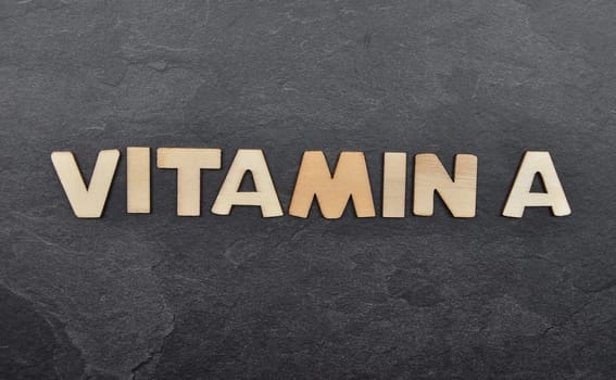 Term from wooden letters on slate board