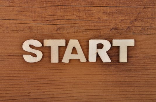Term from wooden letters on old wooden board
