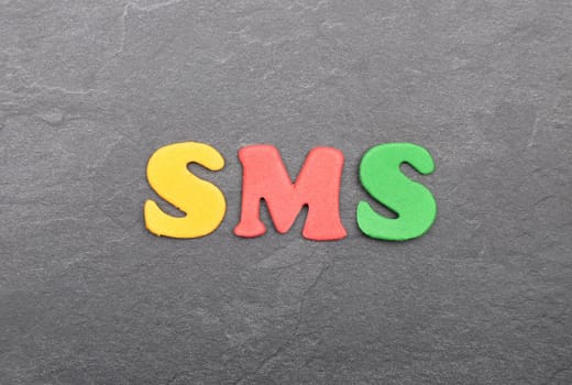 Term from colorful letters on slate board