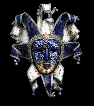 A Blue and gold Venice carnival mask on a black background