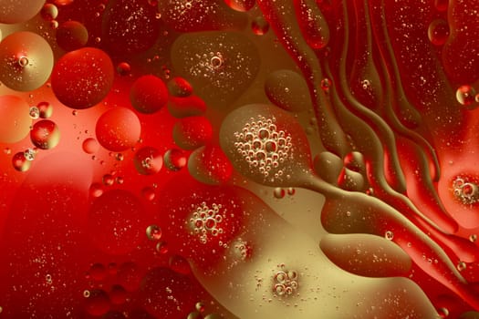 a Close-up water and oil abstract in a rainbow lighting effect