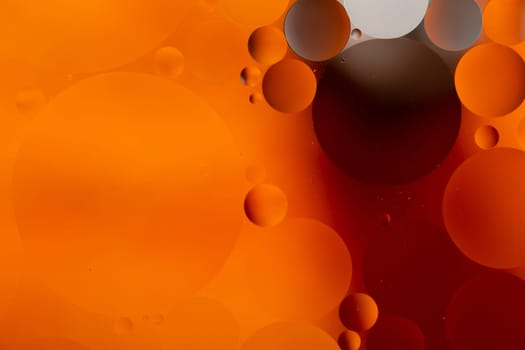 A Close-up water and oil abstract in a rainbow lighting effect