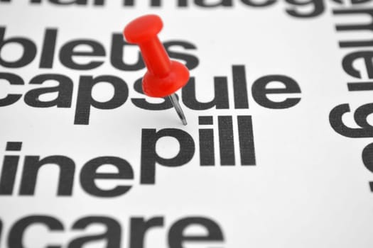 Push pin on pill concept