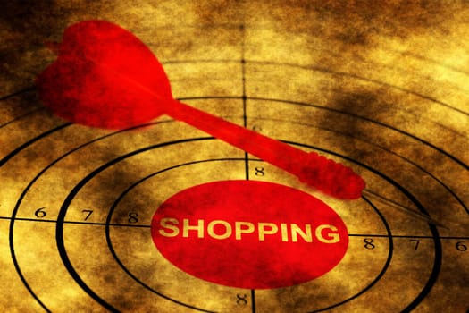 Dart on shopping target grunge concept