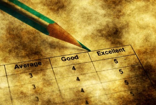 Pen on survey form grunge concept