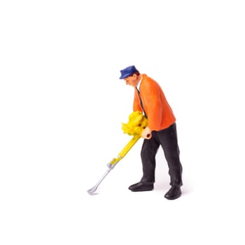 Little People Builder worker with pneumatic hammer drill equipment on whit background