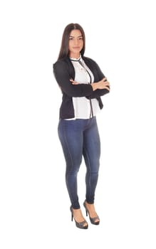 A gorgeous young woman standing in jeans and a black jacket.business outfit from the front, isolated for white background.