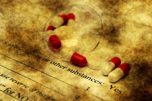 Pills on health form grunge concept