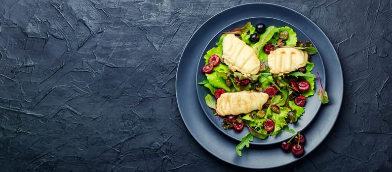 Summer salad of leaf lettuce,halloumi cheese and cherry berries