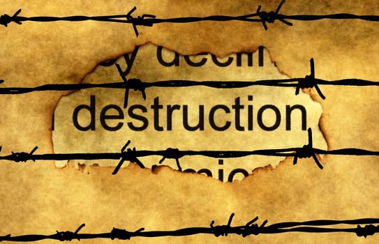 Deconstruction text on paper hole against barbwire