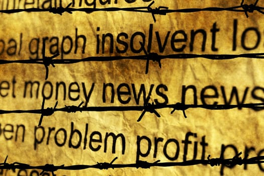 Money and news concept against barbwire